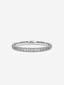 Infinité ring in white gold with a 1.5-carat total diamond weight, featuring a continuous line of pavé diamonds.