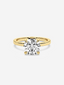 Front view of the Jolie solitaire diamond ring in 18k yellow gold.