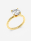 Top view of the Jolie solitaire diamond ring in 18k yellow gold.