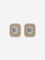 La Perle earrings in 18k yellow gold featuring a luxurious halo of diamonds around a central emerald-cut diamond.