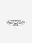 Front view of the Petite Baguette ring in 18k white gold, with a baguette diamond and pave diamond band.