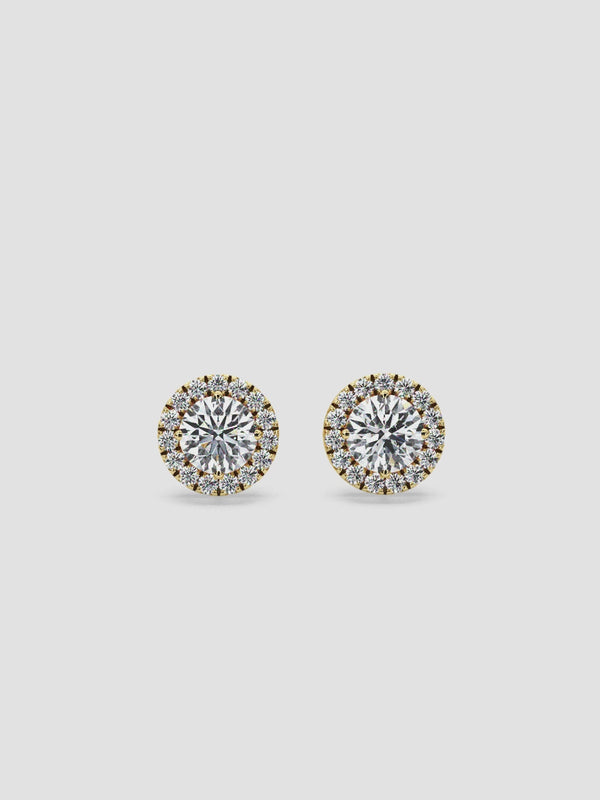 Video of the Petits Parasols earrings in 18k gold, highlighting the luxurious design and secure backing for a refined and comfortable fit.