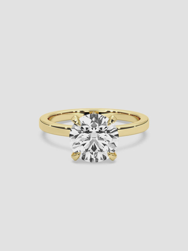 View of the Jolie solitaire diamond ring in 18k yellow gold.